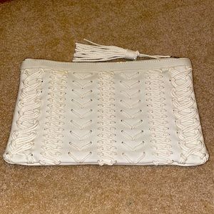 🌸 Steve Madden makeup purse or under arm purse.